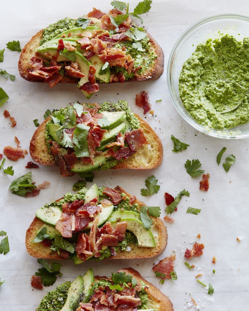 green harissa tartines with bacon and avocado